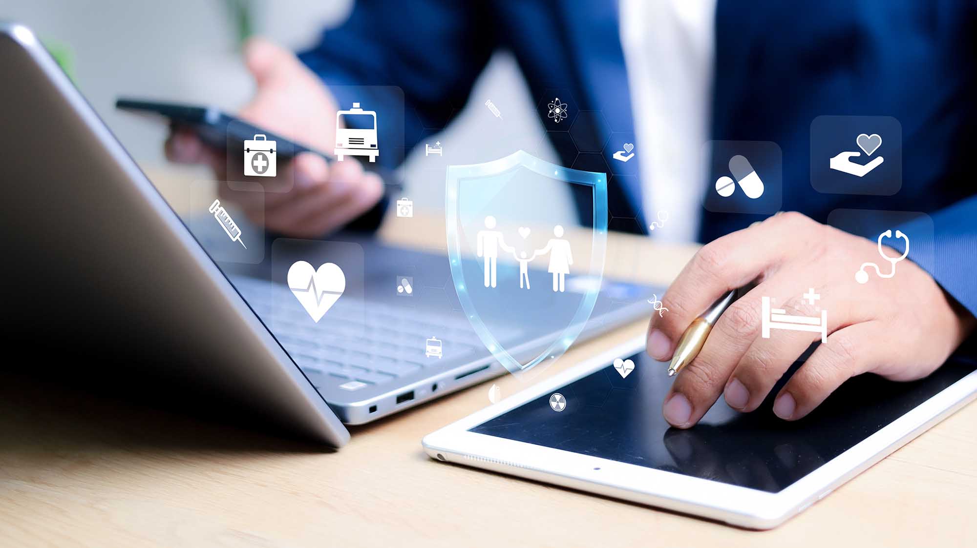 Insurance concept. Businessman using a computer to insurance onl